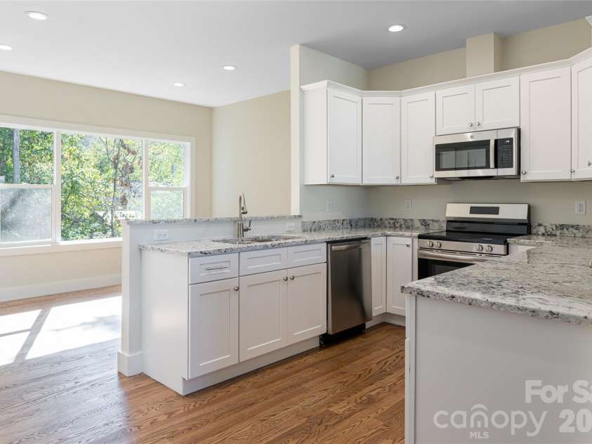 65 Greenwood Fields Drive, Asheville, NC 28804.  MLS# CAR4312948, YatesRealty ID 13633. 