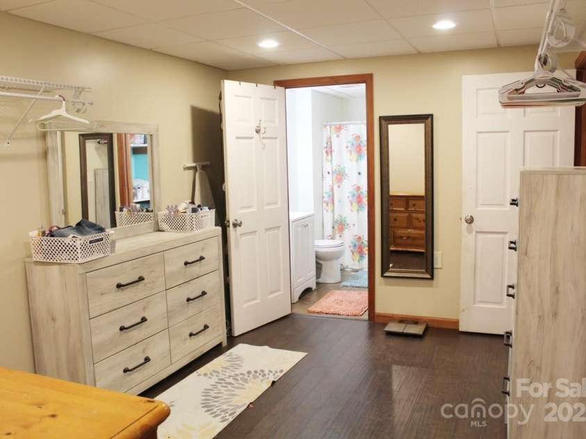141 Charity Lane, Candler, NC 28715.  MLS# CAR4204175, YatesRealty ID 1364. Basement Bonus room with full bath