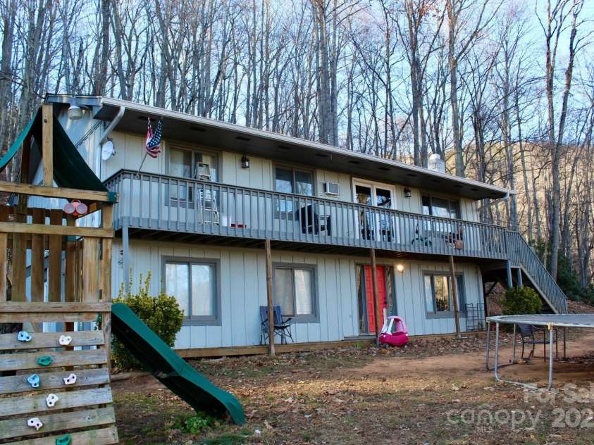 141 Charity Lane, Candler, NC 28715.  MLS# CAR4204175, YatesRealty ID 1364. Front and Side of House