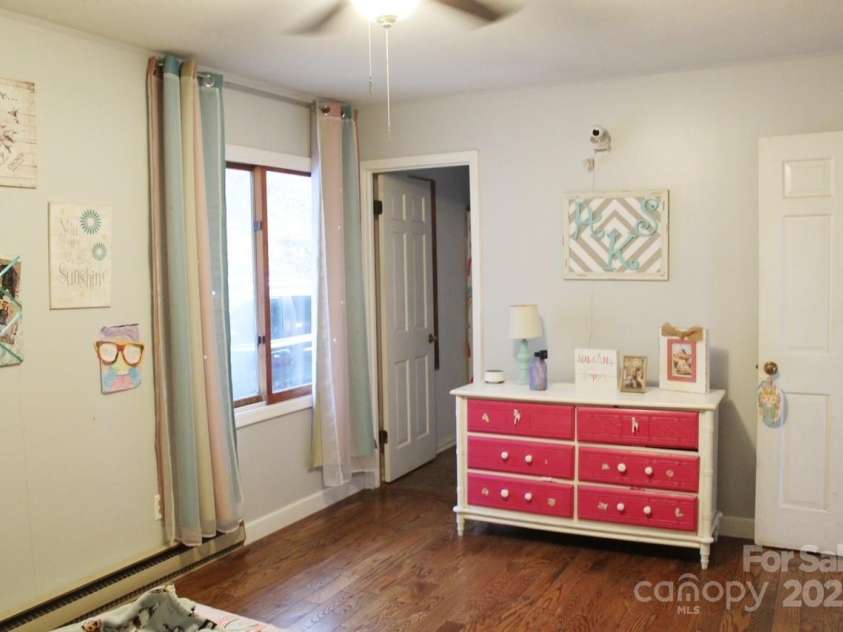 141 Charity Lane, Candler, NC 28715.  MLS# CAR4204175, YatesRealty ID 1364. Upstairs bedroom 1