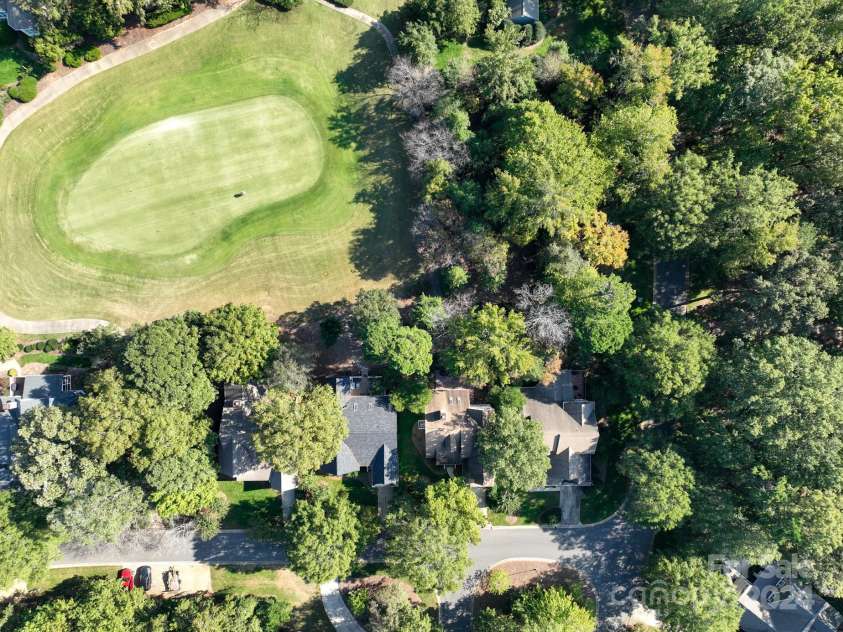 272 Millingport Lane, New London, NC 28127.  MLS# CAR4190396, YatesRealty ID 13644. Aerial View of Home and Community Putting Green