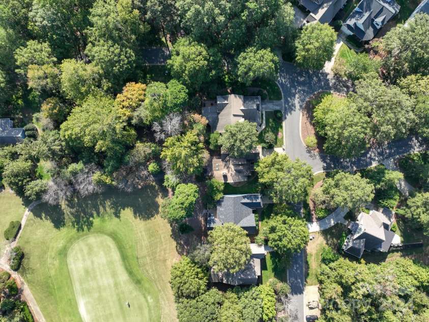 272 Millingport Lane, New London, NC 28127.  MLS# CAR4190396, YatesRealty ID 13644. Aerial View of Home and Community Putting Green