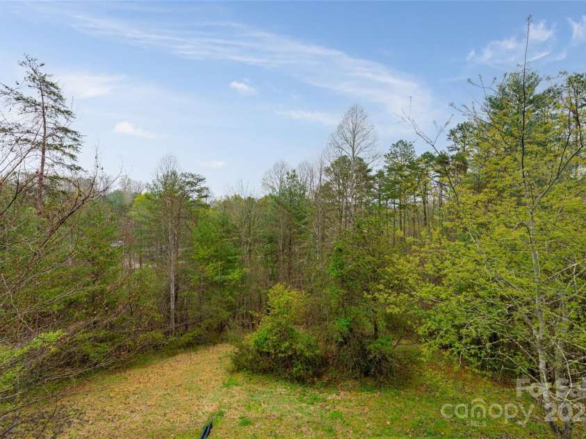 61 Quiet Woods Drive, Leicester, NC 28748.  MLS# CAR4241000, YatesRealty ID 13646. 