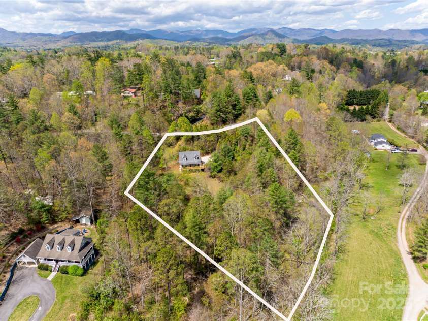 61 Quiet Woods Drive, Leicester, NC 28748.  MLS# CAR4241000, YatesRealty ID 13646. 