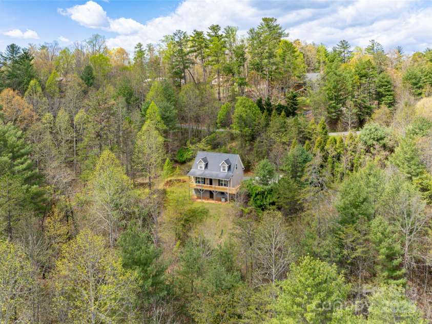 61 Quiet Woods Drive, Leicester, NC 28748.  MLS# CAR4241000, YatesRealty ID 13646. 