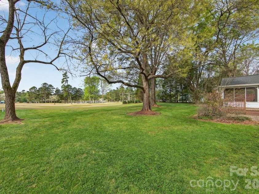 5918 Foxcrest Drive, Mint Hill, NC 28227.  MLS# CAR4364106, YatesRealty ID 13647. Backyard
