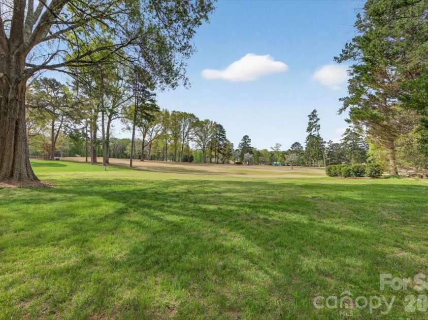 5918 Foxcrest Drive, Mint Hill, NC 28227.  MLS# CAR4364106, YatesRealty ID 13647. Backyard