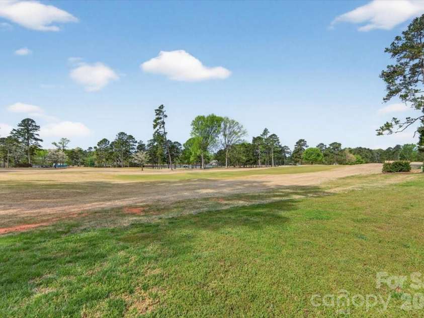 5918 Foxcrest Drive, Mint Hill, NC 28227.  MLS# CAR4364106, YatesRealty ID 13647. Backyard/Fairway