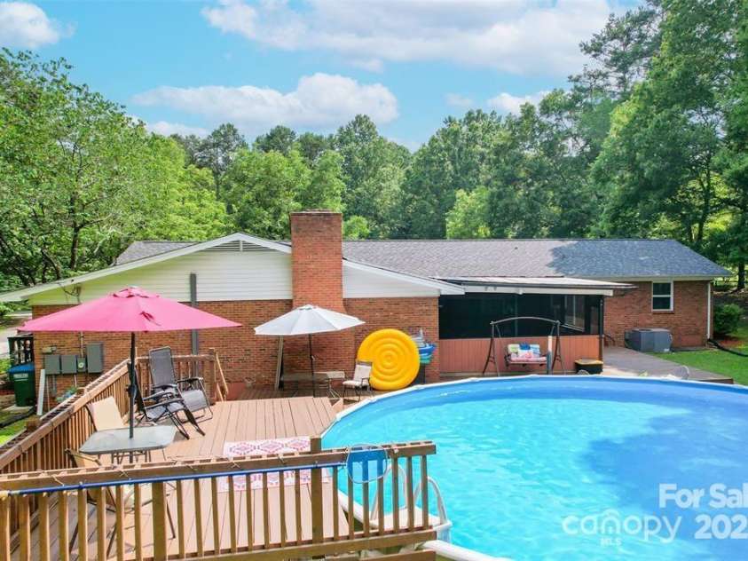 4805 Nesbit Road, Monroe, NC 28112.  MLS# CAR4254388, YatesRealty ID 13650. 2 level custom deck that's well maintained throughout the year