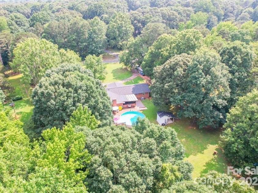 4805 Nesbit Road, Monroe, NC 28112.  MLS# CAR4254388, YatesRealty ID 13650. 5.15ac cleared with beautiful mature trees outlining the property
