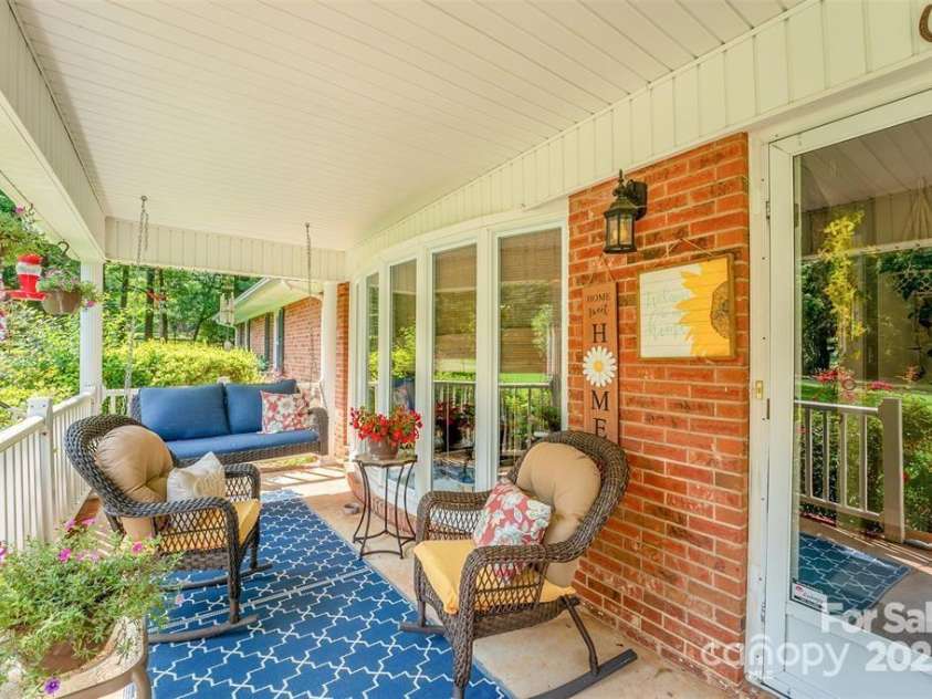 4805 Nesbit Road, Monroe, NC 28112.  MLS# CAR4254388, YatesRealty ID 13650. Enjoy the cool breeze in your favorite rocking chair.