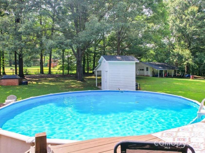 4805 Nesbit Road, Monroe, NC 28112.  MLS# CAR4254388, YatesRealty ID 13650. Huge above ground pool - Just in time for summer.