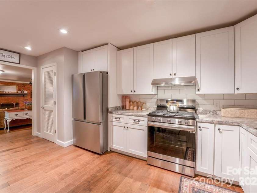 4805 Nesbit Road, Monroe, NC 28112.  MLS# CAR4254388, YatesRealty ID 13650. Kitchen casually flows into the main living area