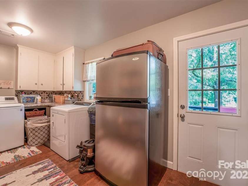 4805 Nesbit Road, Monroe, NC 28112.  MLS# CAR4254388, YatesRealty ID 13650. Large mud room with laundry.. You keep the washer & dryer + the additional fridge