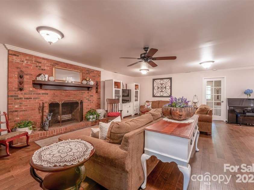 4805 Nesbit Road, Monroe, NC 28112.  MLS# CAR4254388, YatesRealty ID 13650. Wood burning fireplace to set the atmosphere
