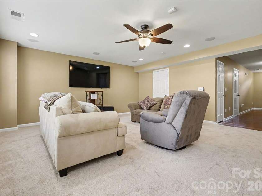 6148 Rockefeller Lane, Charlotte, NC 28210.  MLS# CAR4356884, YatesRealty ID 13650.  Perfect For Media Room / Bonus Room / Exercise Studio