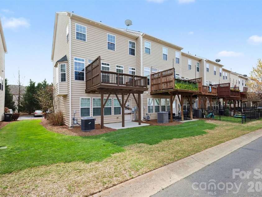 6148 Rockefeller Lane, Charlotte, NC 28210.  MLS# CAR4356884, YatesRealty ID 13650. View Of Deck & End Unit Privacy