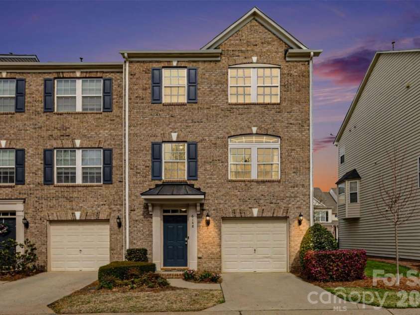 6148 Rockefeller Lane, Charlotte, NC 28210.  MLS# CAR4356884, YatesRealty ID 13650. Views At Dusk 