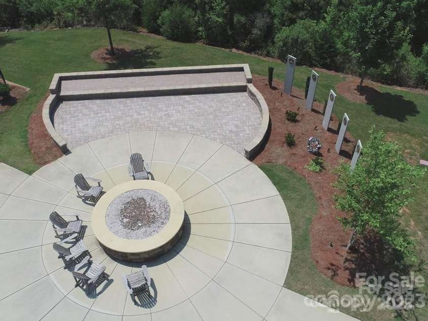 3052 Santee Court, Indian Land, SC 29707.  MLS# CAR4235308, YatesRealty ID 13653. Sun City Carolina Lakes honors its Veterans with a memorial garden and a comfortable place to relax.