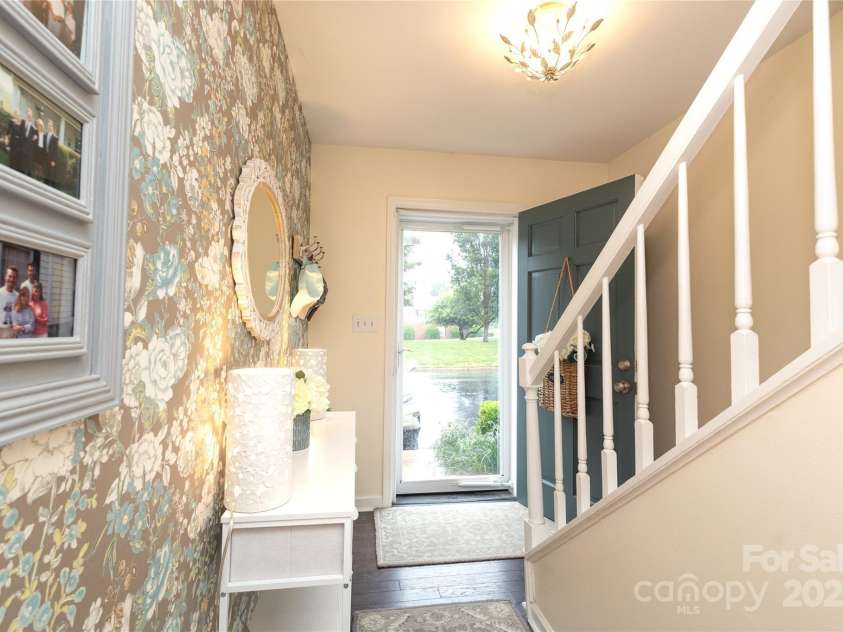 8306 Knights Bridge Road, Charlotte, NC 28210.  MLS# CAR4257820, YatesRealty ID 13656. Angle of the foyer from the main level hall.