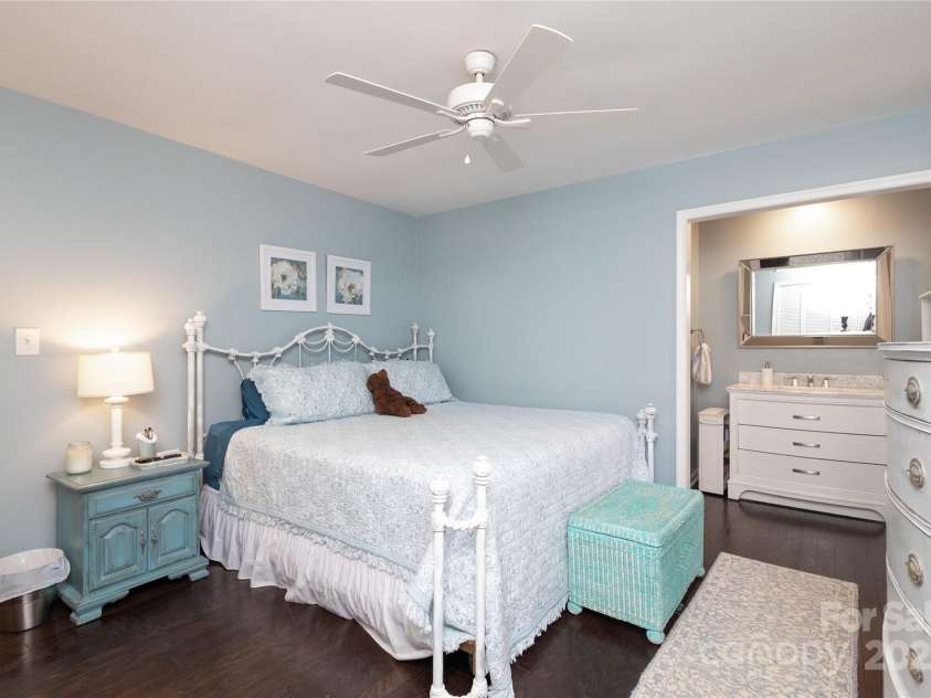 8306 Knights Bridge Road, Charlotte, NC 28210.  MLS# CAR4257820, YatesRealty ID 13656. Charming Primary Bedroom Suite features new bathroom cabinetry and counter.