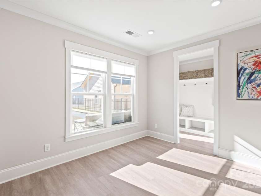 1066 Riverwalk Parkway, Rock Hill, SC 29730.  MLS# CAR4210322, YatesRealty ID 1366. Convenience meets style! The kitchen seamlessly connects to a handy drop zone area and a stylish powder bathroom—perfect for everyday living.