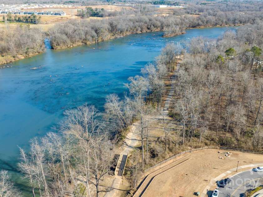 1066 Riverwalk Parkway, Rock Hill, SC 29730.  MLS# CAR4210322, YatesRealty ID 1366. Enjoy the beauty and tranquility of the Catawba River, just steps from your home—perfect for kayaking, rafting, or simply soaking in the view.