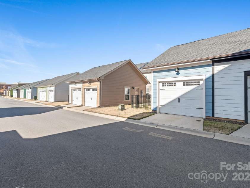 1066 Riverwalk Parkway, Rock Hill, SC 29730.  MLS# CAR4210322, YatesRealty ID 1366. Experience the ease of back alley access to your garage, offering a seamless, private entry and adding to the convenience of everyday living.
