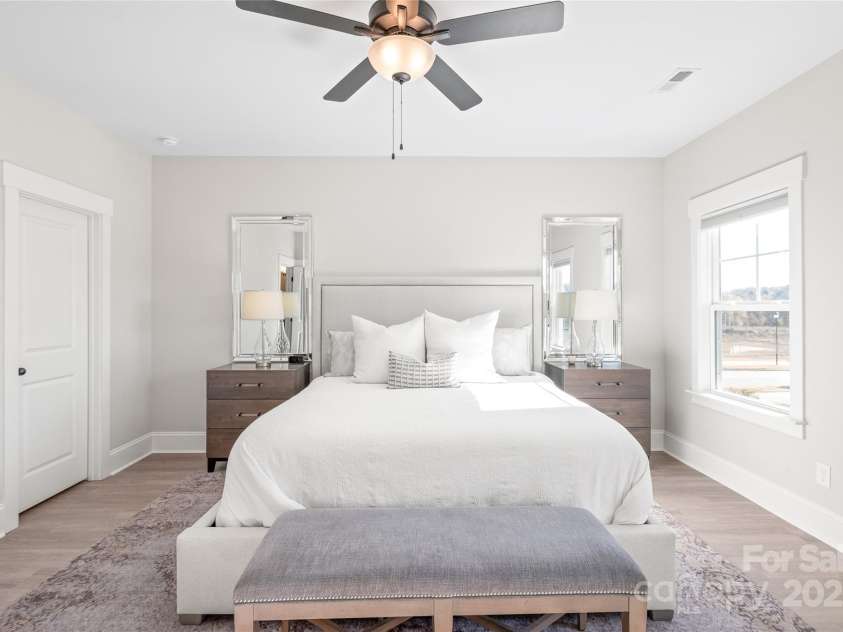 1066 Riverwalk Parkway, Rock Hill, SC 29730.  MLS# CAR4210322, YatesRealty ID 1366. Retreat to the spacious primary bedroom, complete with not one, but TWO walk-in closets for all your storage needs.