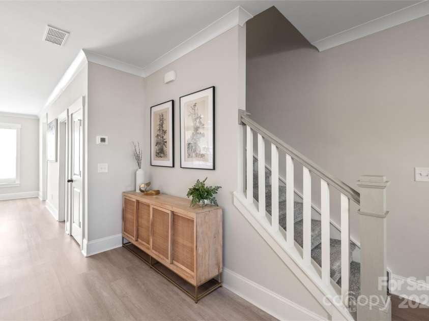 1066 Riverwalk Parkway, Rock Hill, SC 29730.  MLS# CAR4210322, YatesRealty ID 1366. Step inside to a bright and inviting space with fresh neutral walls and pristine LVP floors, creating a warm and welcoming ambiance.