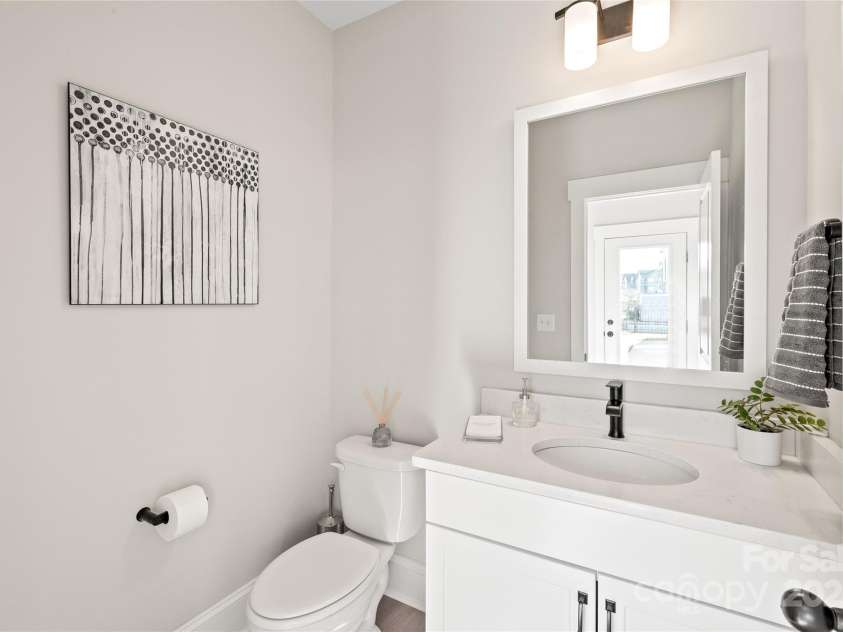 1066 Riverwalk Parkway, Rock Hill, SC 29730.  MLS# CAR4210322, YatesRealty ID 1366. Stylish and practical, the powder bathroom is the perfect touch for guests and everyday use
