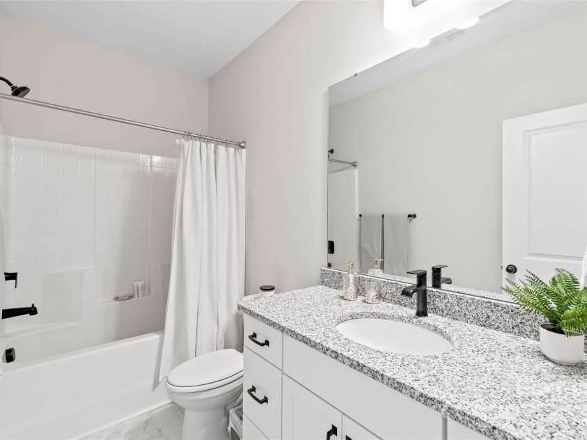 1066 Riverwalk Parkway, Rock Hill, SC 29730.  MLS# CAR4210322, YatesRealty ID 1366. The full bathroom, shared by Bedrooms 2 and 3, features a convenient tub/shower combo—perfect for everyday comfort and convenience!