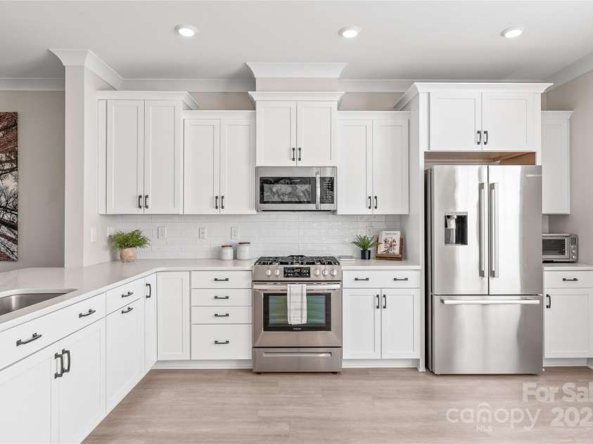 1066 Riverwalk Parkway, Rock Hill, SC 29730.  MLS# CAR4210322, YatesRealty ID 1366. The kitchen boasts an abundance of cabinet space, keeping everything organized and within easy reach.