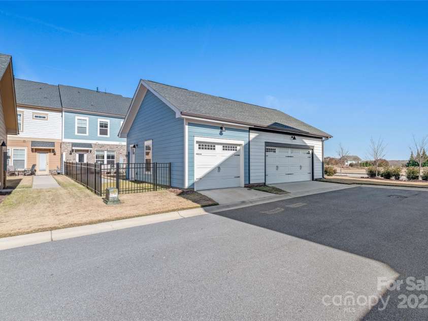 1066 Riverwalk Parkway, Rock Hill, SC 29730.  MLS# CAR4210322, YatesRealty ID 1366. The one-car garage provides functionality and extra storage space for all your needs!