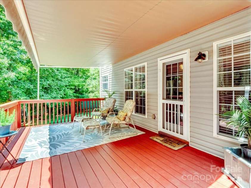 821 Lynnwood Farms Drive, Fort Mill, SC 29715.  MLS# CAR4234073, YatesRealty ID 13664. Deck w/Awning