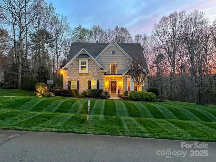 821 Lynnwood Farms Drive, Fort Mill, SC 29715.  MLS# CAR4234073, YatesRealty ID 13664. Front Twilight