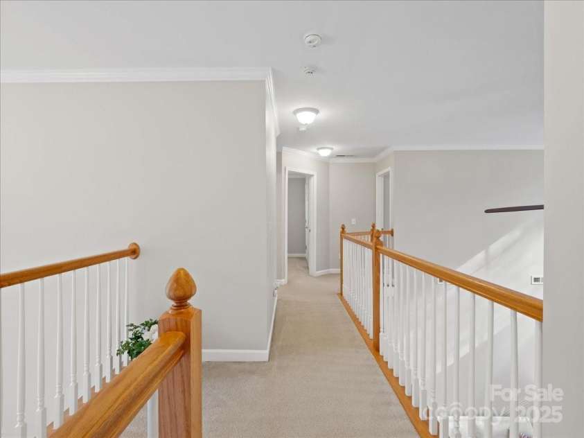 821 Lynnwood Farms Drive, Fort Mill, SC 29715.  MLS# CAR4234073, YatesRealty ID 13664. Upstairs Hallway View2