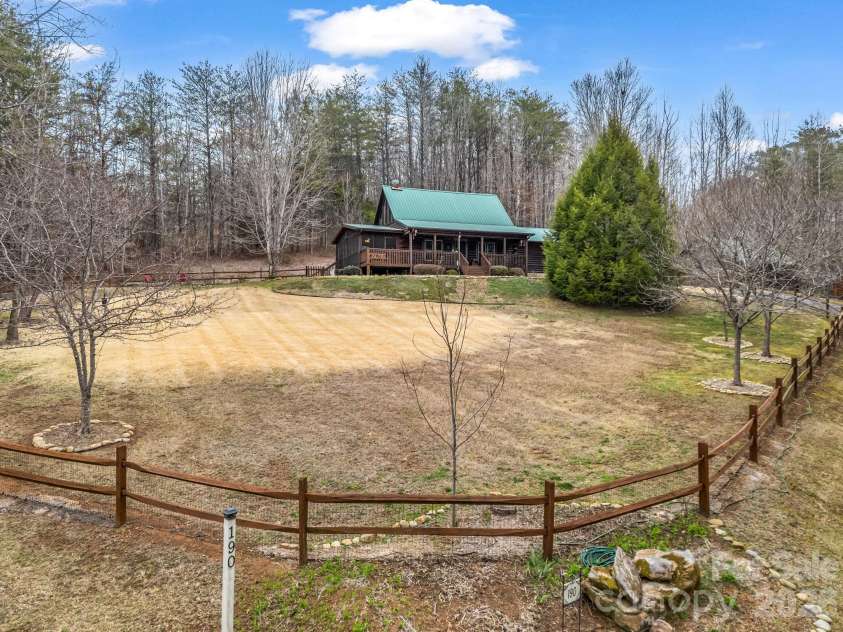 190 Observation Ridge, Rutherfordton, NC 28139.  MLS# CAR4351178, YatesRealty ID 13668. Beautiful- sloping Front Yard