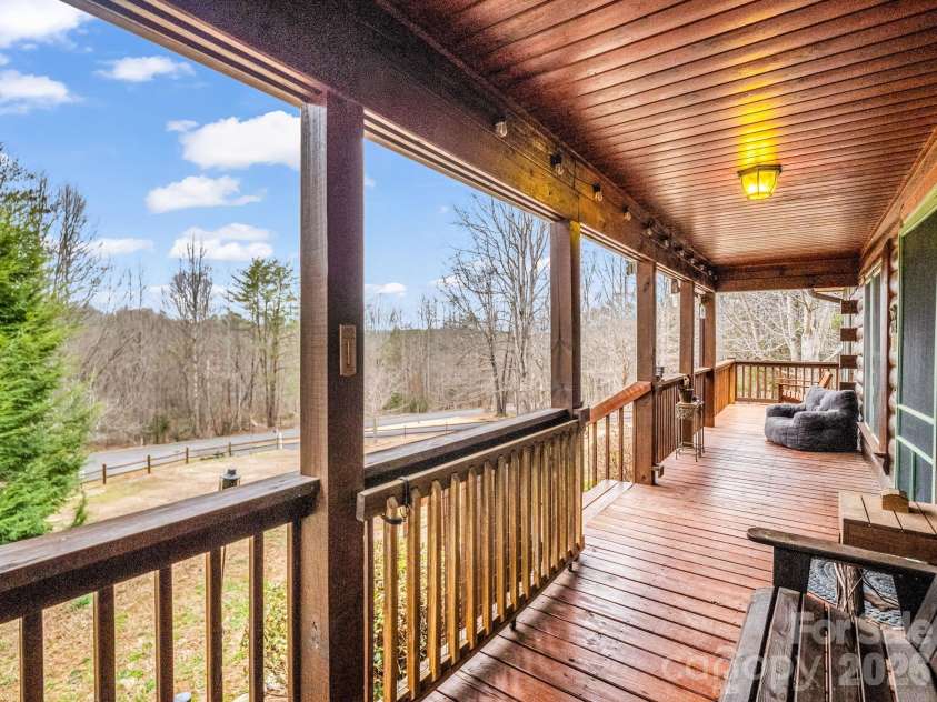 190 Observation Ridge, Rutherfordton, NC 28139.  MLS# CAR4351178, YatesRealty ID 13668. Front Porch over looking front yard and drive