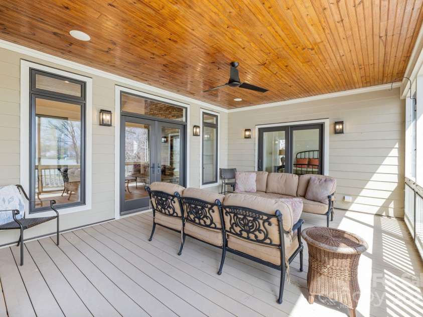239 Paradise Peninsula Road, Mooresville, NC 28117.  MLS# CAR4242149, YatesRealty ID 13668. Covered Screened Deck
