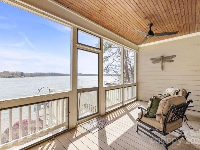 239 Paradise Peninsula Road, Mooresville, NC 28117.  MLS# CAR4242149, YatesRealty ID 13668. Covered Screened Deck