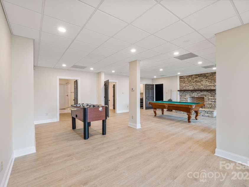239 Paradise Peninsula Road, Mooresville, NC 28117.  MLS# CAR4242149, YatesRealty ID 13668. Lower Level Entertainment