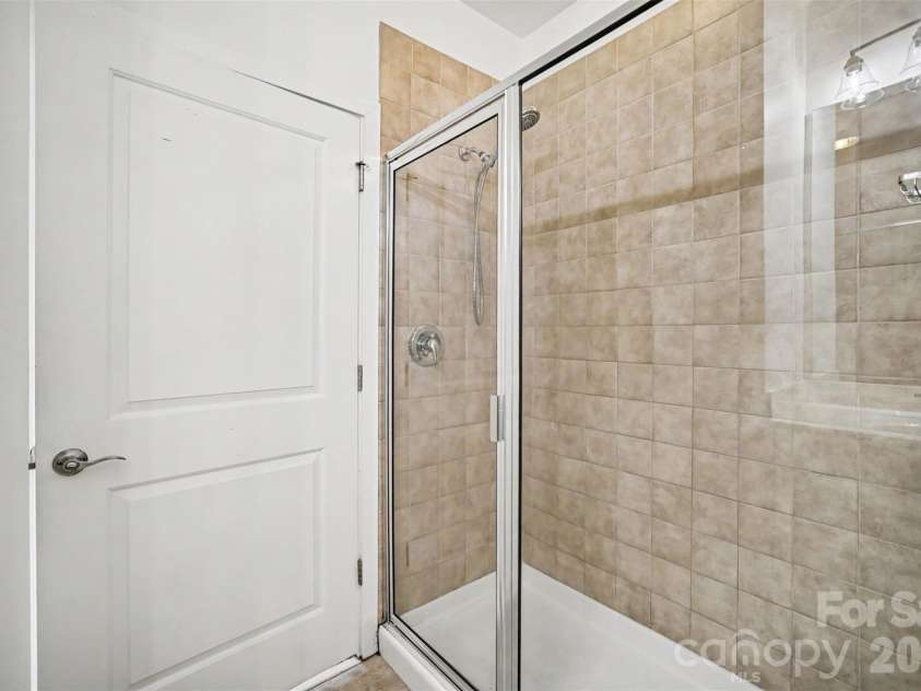 630 Calvert Street, Charlotte, NC 28208.  MLS# CAR4430308, YatesRealty ID 1367. Primary Bathroom Shower