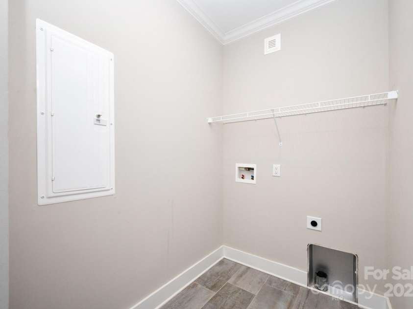 115 Summer Pine Lane, Fairview, NC 28730.  MLS# CAR4252070, YatesRealty ID 13675. Laundry room on main level