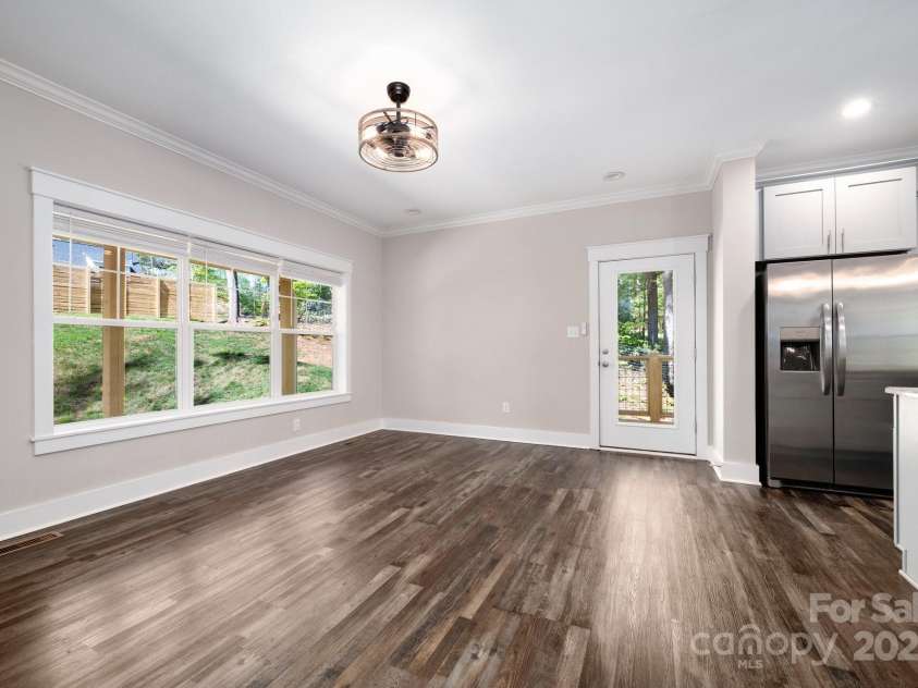 115 Summer Pine Lane, Fairview, NC 28730.  MLS# CAR4252070, YatesRealty ID 13675. Living area opens to kitchen