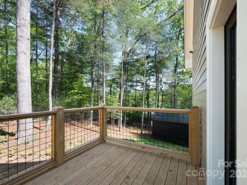 115 Summer Pine Lane, Fairview, NC 28730.  MLS# CAR4252070, YatesRealty ID 13675. Side porch for coffee or cocktails!