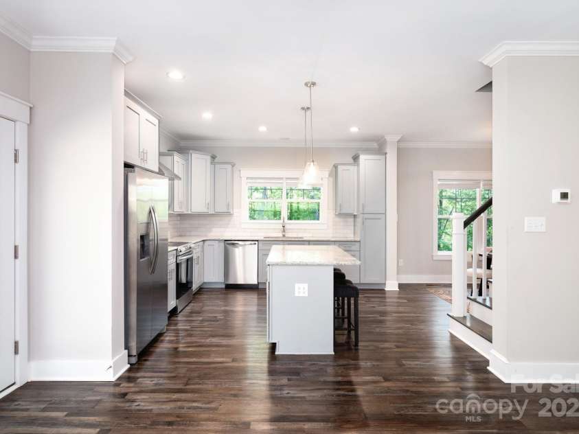 115 Summer Pine Lane, Fairview, NC 28730.  MLS# CAR4252070, YatesRealty ID 13675. Side porch off kitchen and living areas