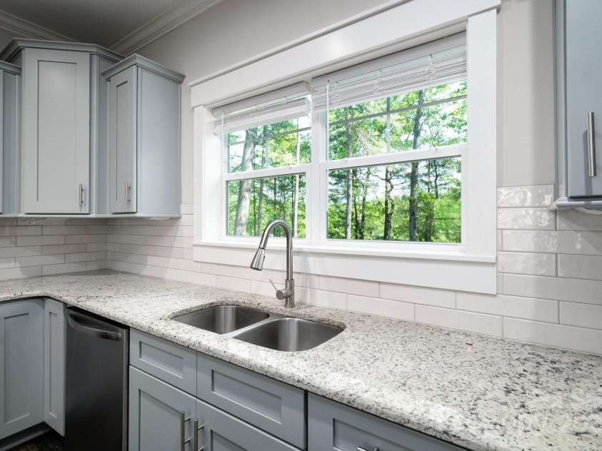 115 Summer Pine Lane, Fairview, NC 28730.  MLS# CAR4252070, YatesRealty ID 13675. Tile backsplash and granite counters