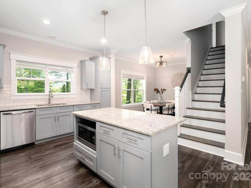 115 Summer Pine Lane, Fairview, NC 28730.  MLS# CAR4252070, YatesRealty ID 13675. Upstairs leads to two bedrooms, office, full bath and storage