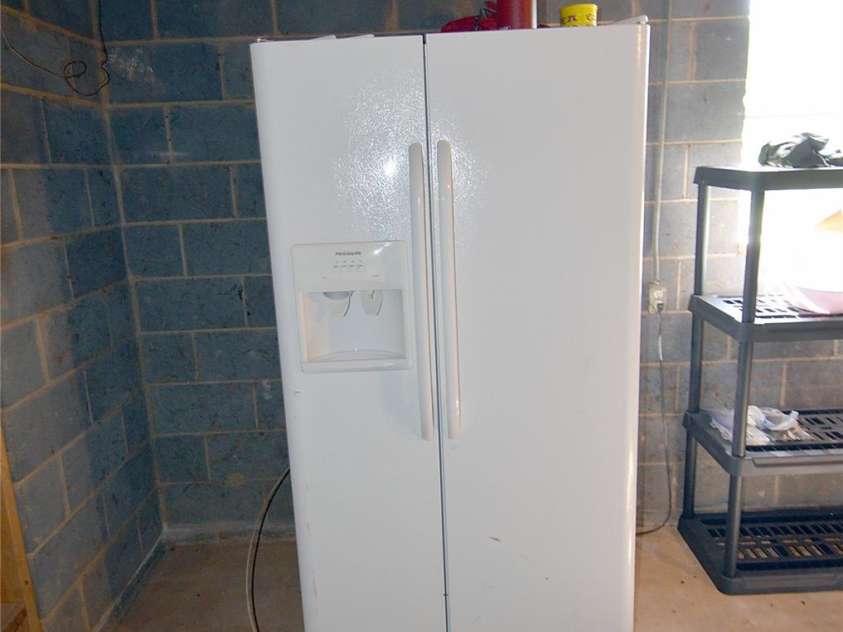 204 Quail Hollow Road, Marion, NC 28752.  MLS# CAR4244406, YatesRealty ID 13677. Basement refrigerator